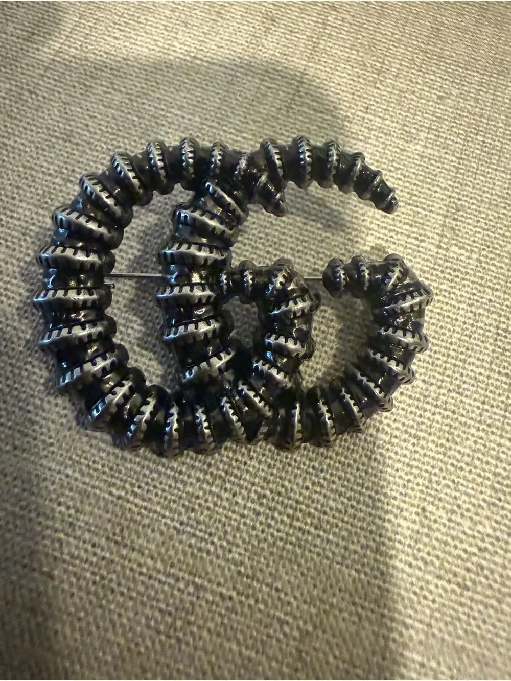 New with box Gucci gun metal color gg brooch
